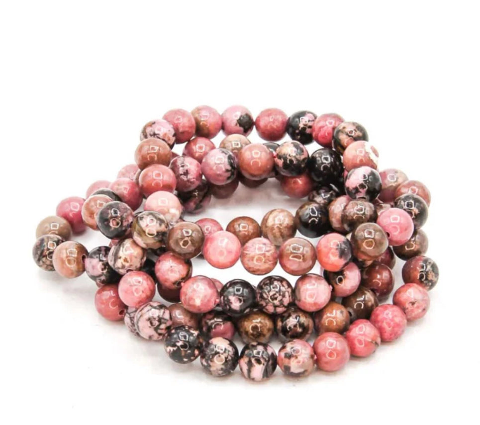 “Rhodonite crystal bead bracelet for love and balance”