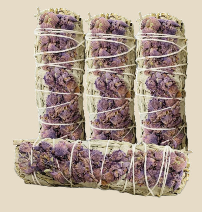 White Sage & Lavender Smudge Stick with sage and lavender tied with twine.