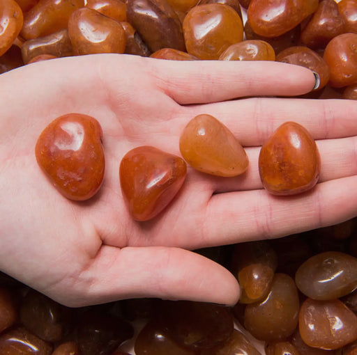 Carnelian stone, an energizing and grounding crystal for vitality and creativity

