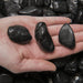 Tumbled black tourmaline crystal, perfect for meditation or energy healing