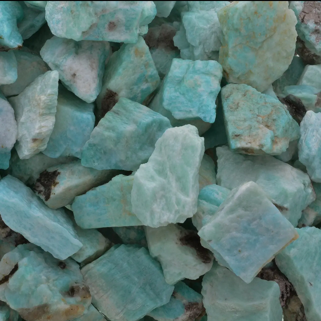 Raw Rough Amazonite Crystal, green-blue stone known for its calming and balancing properties.