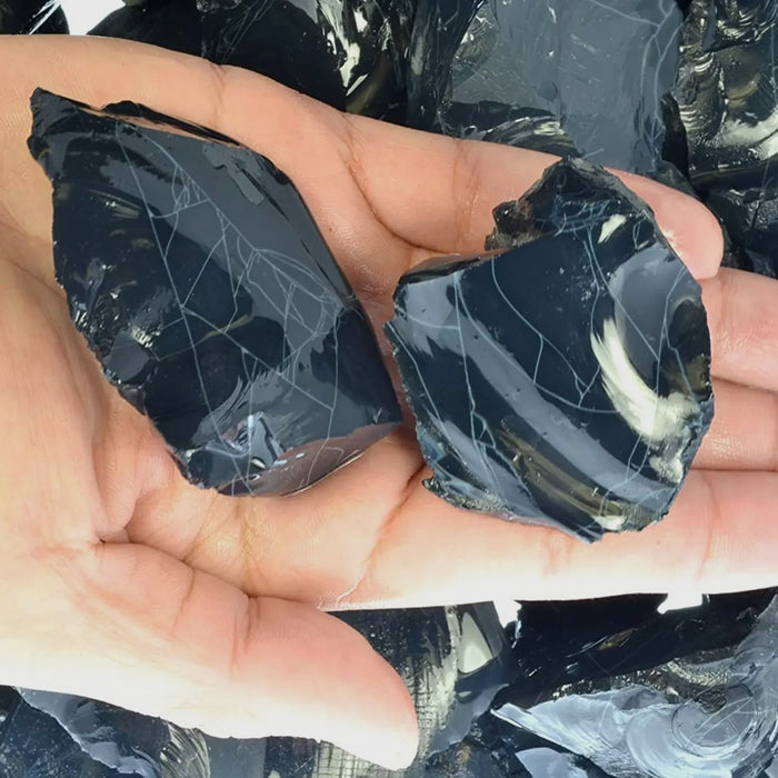 Obsidian stone with natural imperfections, ideal for grounding and protection