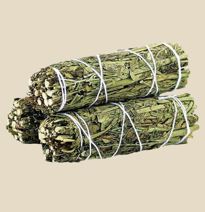 Crafted from bundled Rue herb, this smudge stick releases potent, aromatic smoke.