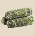 Crafted from bundled Rue herb, this smudge stick releases potent, aromatic smoke.