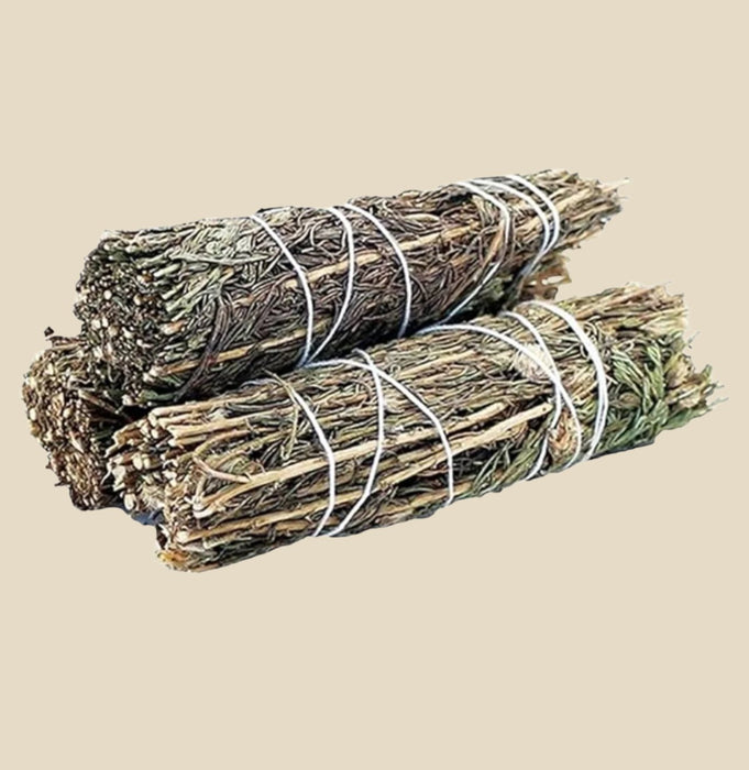 a bundle of fragrant sage leaves wrapped tightly with natural string