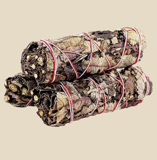 a hand-tied bundle of dark, rich sage leaves, wrapped tightly with natural string.