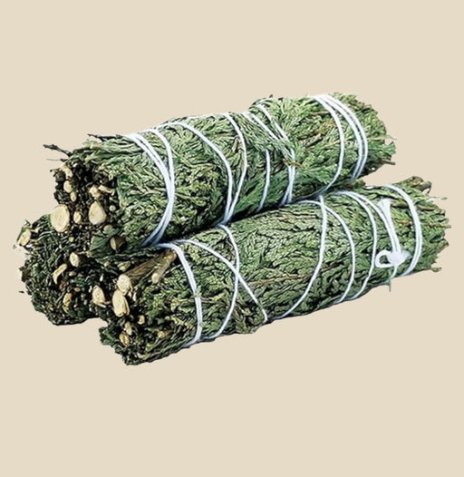 a bundle of aromatic cedar leaves neatly tied with natural twine.