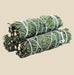 a bundle of aromatic cedar leaves neatly tied with natural twine.