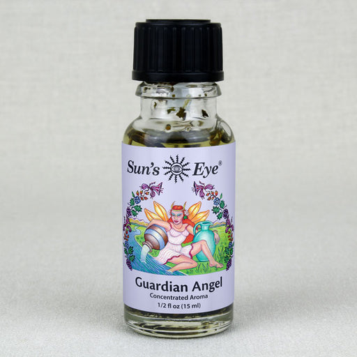 A bottle of Guardian Angel Oil with a feather