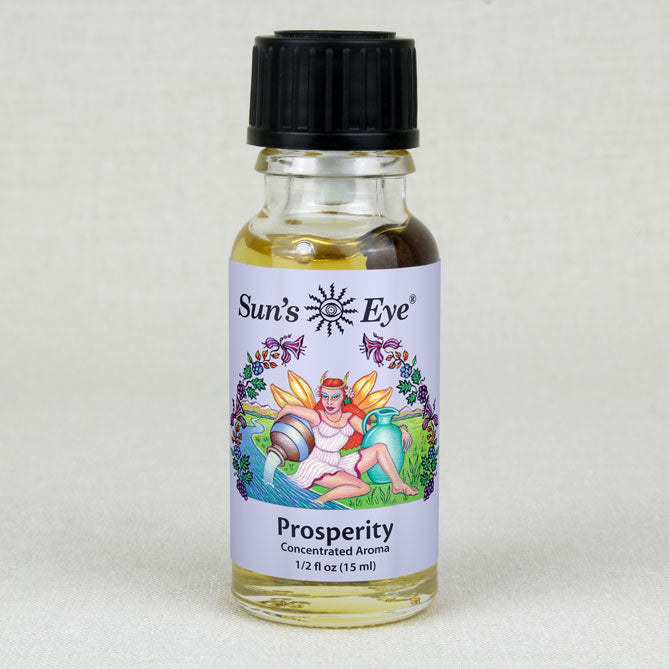 A bottle of essential oil for attracting abundance