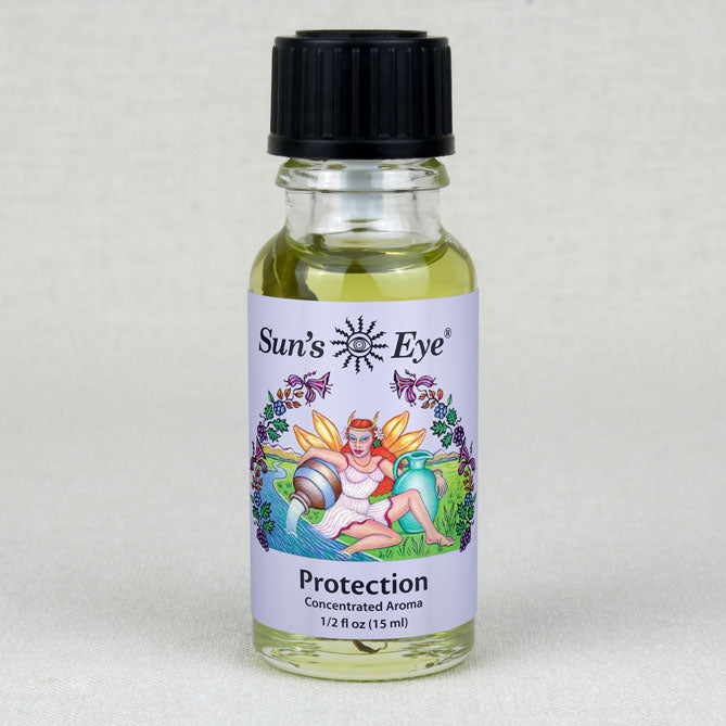 A bottle of Protection Oil with a crystal